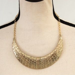 Bold choker necklace textured matte gold Wildlife Heidi Klum